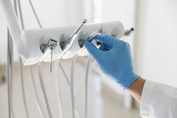 Professional Invisalign Clear Aligners technician working in Farmingdale, NY